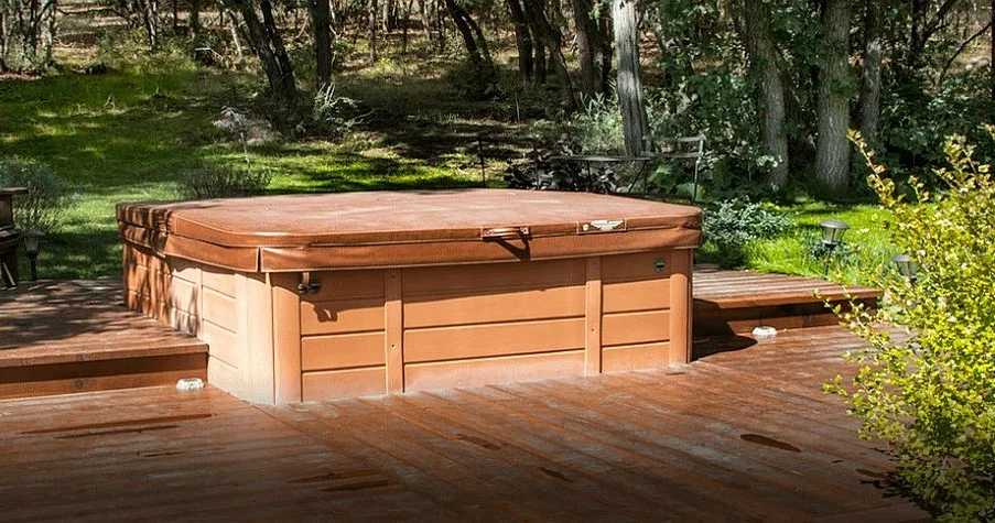 Outdoor hot tub on the deck at Country Sunshine Bed & Breakfast